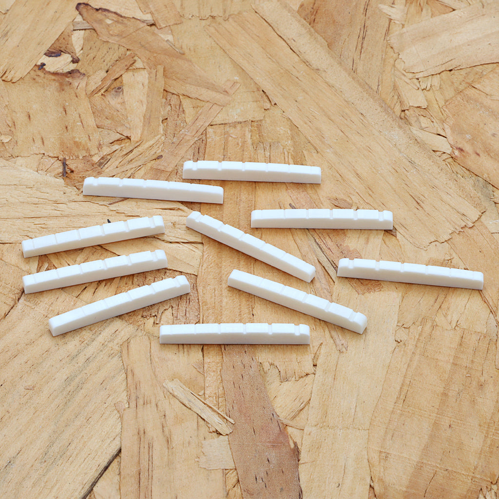 10Pcs 42mm Guitar Nut Slotted Bone Nut for 6 String Strat Tele Electric Guitar,Flat Bottom